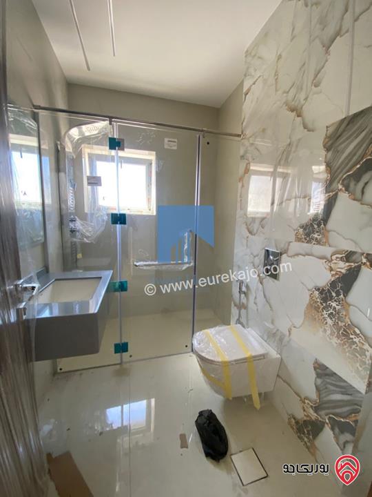 شقة فاخرة للبيع في عمان خلدا - قرب إشارة البنك العربي طابق ثالث 175م مع روف دوبلكس 120م لم تسكن