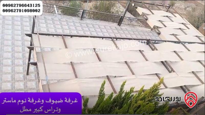 مزرعة مساحة الأرض 3500م والبناء طابقين دوبلكس 200م ومسبح للبيع في جرش - المصطبة