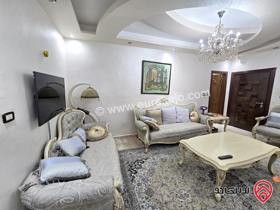 شقة ارضية مساحة 131م مع تراس 50م ومدخل خاص للبيع في عمان - الرابية 