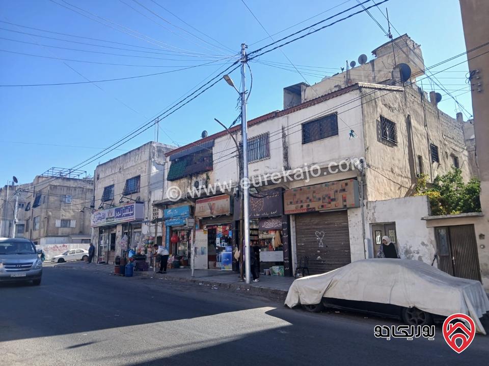 مجمع تجاري 6 ابواب تجارية و 5 شقق سكنية على أرض 531م للبيع في عمان - حي نزال
