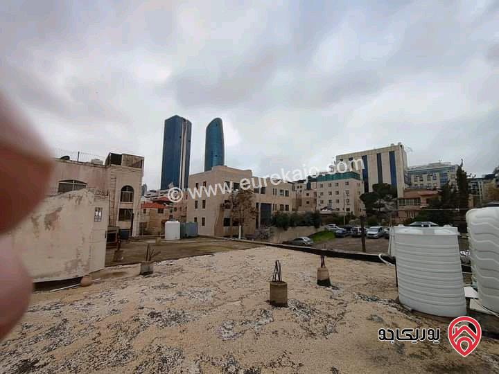 بناية سكنية وارض تحتوي على 4 شقق مقابل البوليفارد والعبدلي مول ومطلة على فندق اللاند مارك (هيلتون)  بمنطقة ممتازة للاستثمار للبيع في عمان - العبدلي
