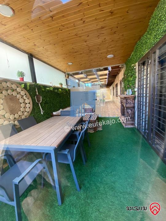 شقة أرضية مفروشة فاخرة للبيع في عمان - أم السماق مساحة 245م مع حديقة وترسات 120م