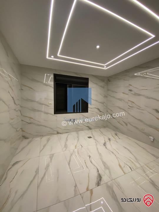 شقة أرضية 170م مع ترس 100م تشطيب سوبر ديلوكس لم تسكن للبيع في عمان - تلاع العلي