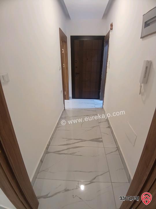 شقة لم تسكن مساحة 160م طابق ثاني للايجار في اربد - جنوب كومباوند الأمعري 