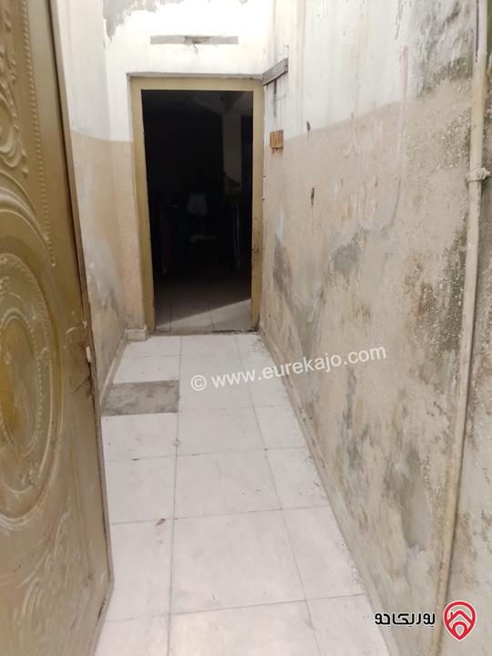 عمارة على قطعة ارض مساحة 250م للبيع في عمان - منطقة الوحدات