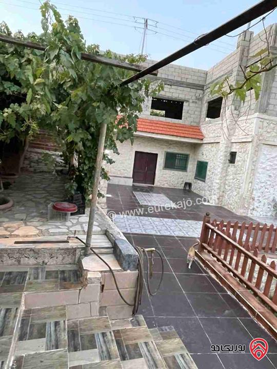 منزل طابقين مساحة 500م وأرض 1000م للبيع بسعر قابل للتفاوض في عمان - أم البساتين