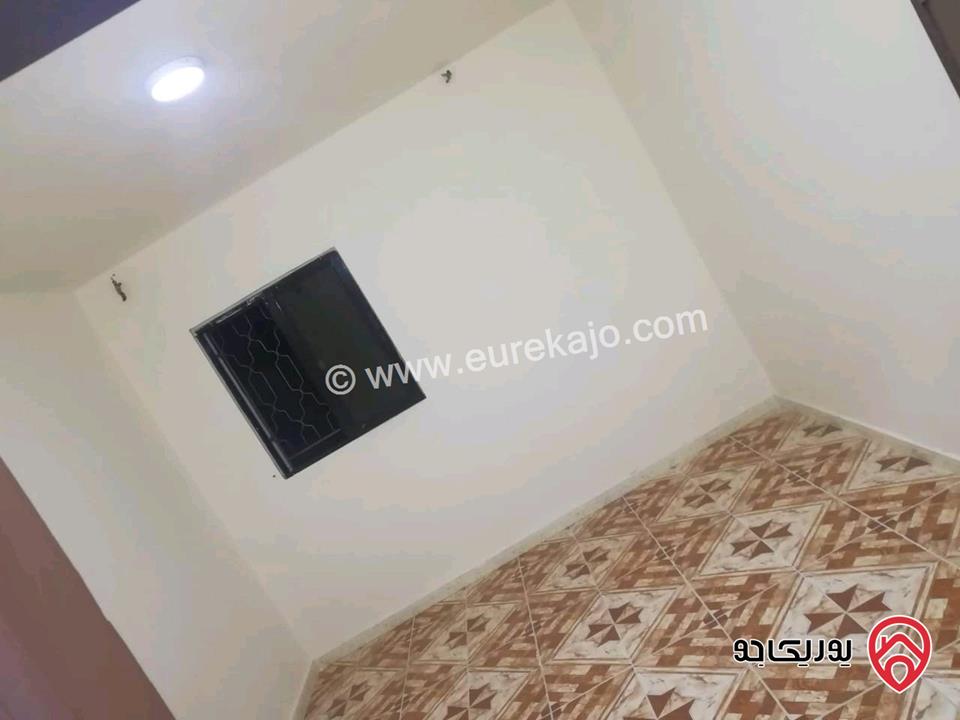 شقة طابق ثاني مساحة 130م للإيجار في اربد - مجمع الأغوار الجديد 