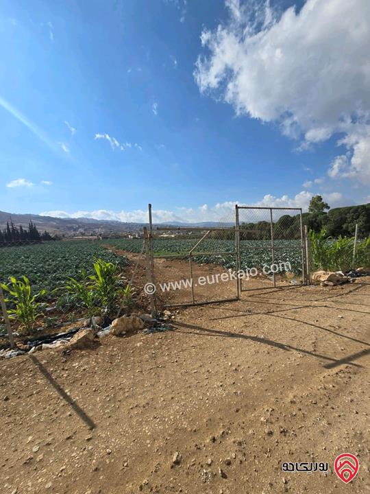 قطعة ارض ومشروع استثماري ناجح مساحة 24 دونم و 309م للبيع من اراضي شمال عمان - موبص تبعد عن شارع الاردن موقع قصر الجبل دقيقتين حوض سنينة الماء  