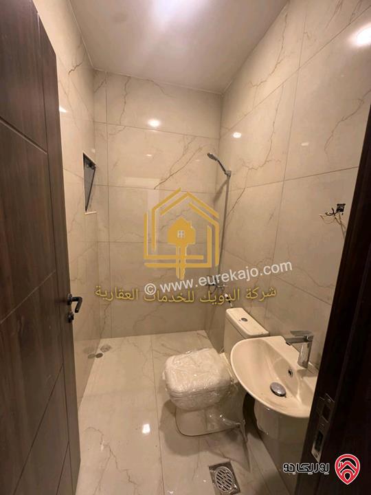 شقة جديدة لم تسكن طابق ارضي مساحة 100م للإيجار في عمان - ضاحية الرشيد 