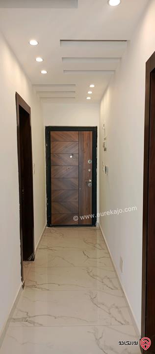 شقة جديدة طابق اول مساحة 150م للبيع في عمان - الجبيهة خلف حديقة الجبيهة