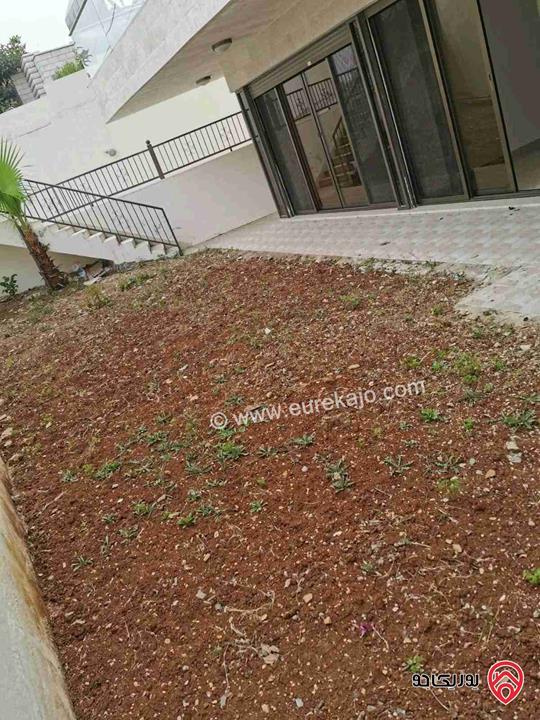 شقة طابق شبه ارضي مساحة 200م مع حديقة 200م للبيع في عمان - الدوار الرابع 