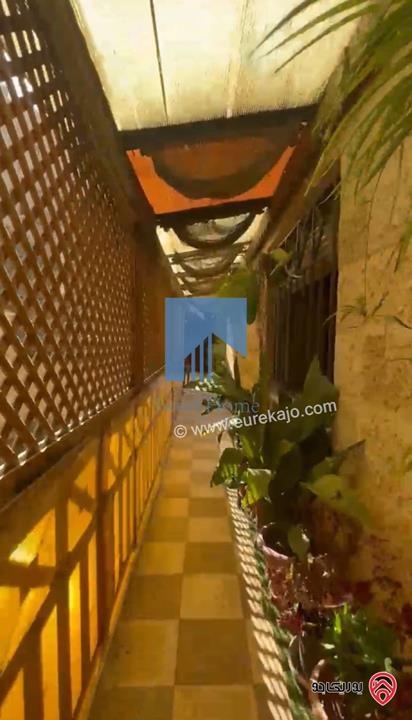 شقة شبه ارضية مساحة 205م مع حديقة وترسات 220م للبيع في عمان - تلاع العلي