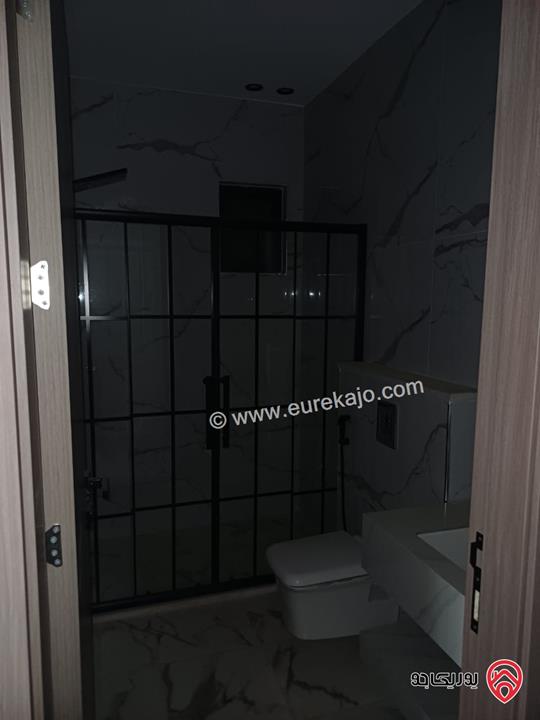 شقة مميزة تشطيب سوبر ديلوكس طابق ارضي مساحة 169م + ترس بناء جديد للبيع في عمان - المقابلين