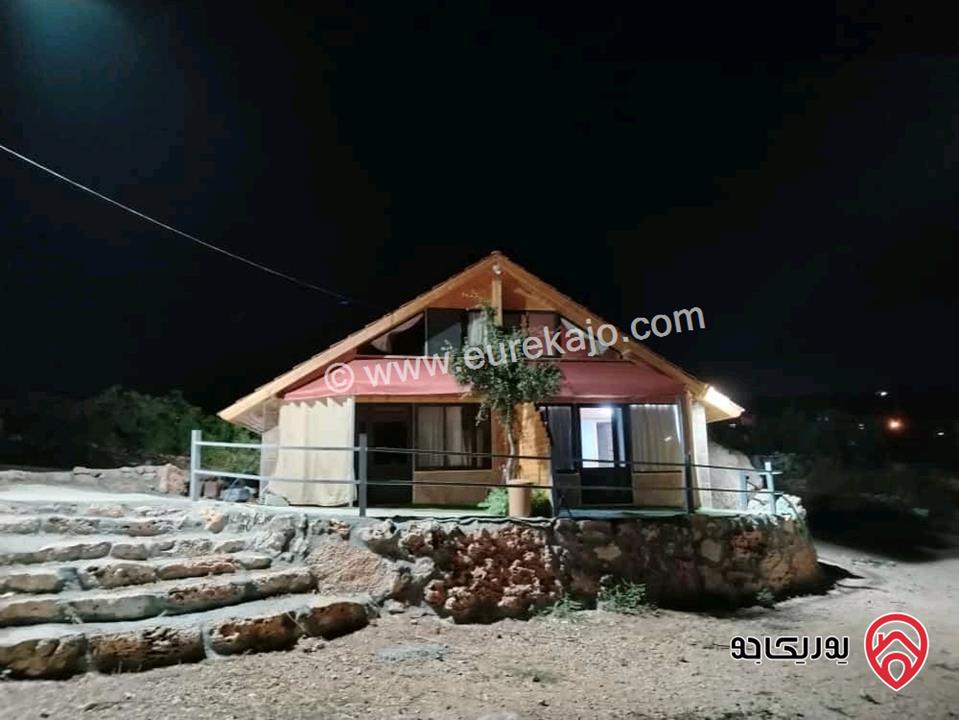 أكواخ وشقق كرم العنب للايجار اليومي في عجلون عبين تبعد 1 كيلومتر عن مثلث عبين تقع على شارع عبين عين جنا 