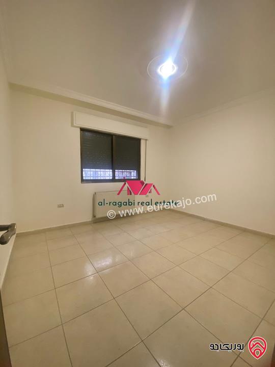 شقة فارغة شبه ارضية مساحة 165م للايجار في عمان - الرابية