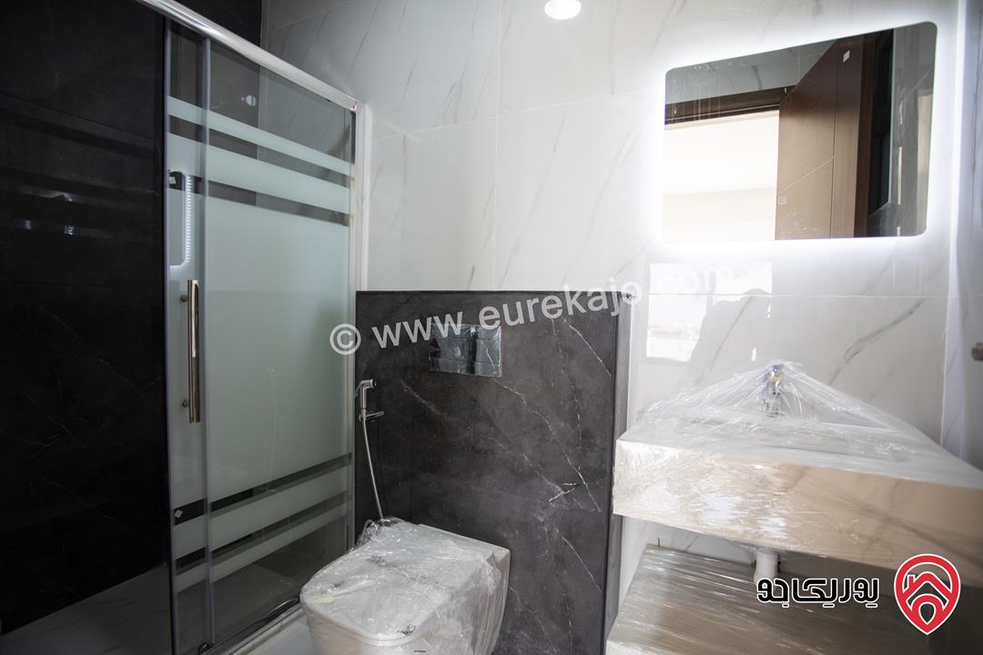 شقة طابق ارضي مساحة 184 م مع كراج و مدخل مستقل للبيع في عمان - الجبيهة حي المنصور 