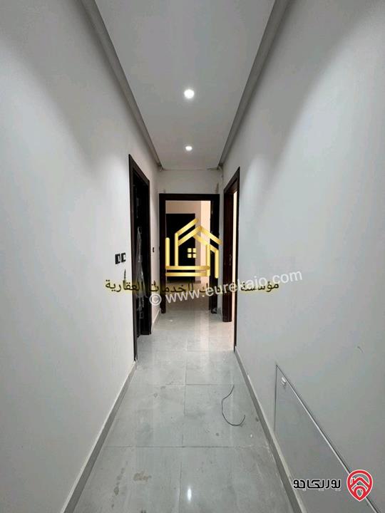 شقة جديدة لم تسكن طابق ارضي مساحة 125م للإيجار في عمان - مرج الحمام 