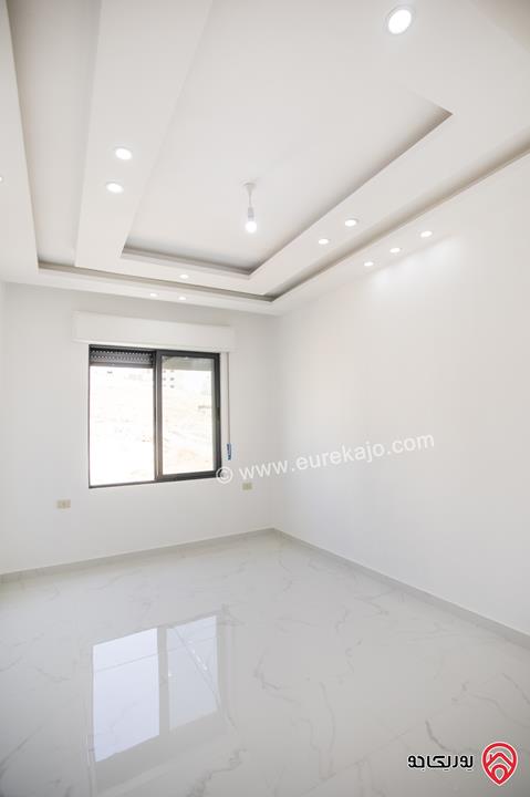 شقة فاخرة طابق ثالث مع روف مساحة 170م مع ترس 100م للبيع في عمان - ابو علندا بسعر مغري جدا مع امكانية التقسيط من المالك