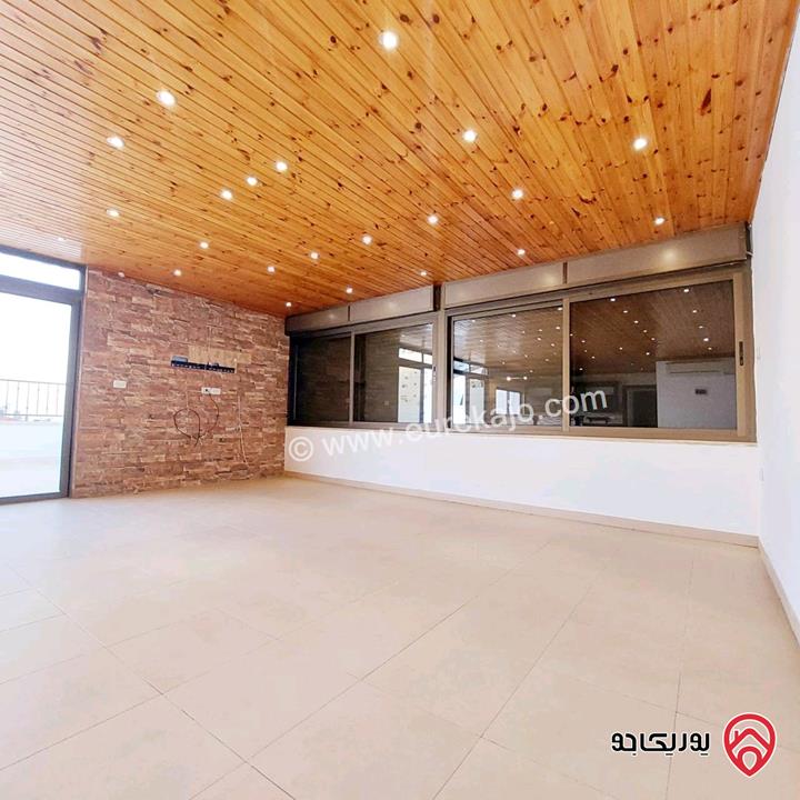 شقة طابق اخير مع روف مساحة 183م للبيع في عمان - خلدا