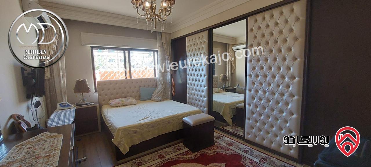 شقة ارضية مفروشة للايجار في عمان - الجاردنز مساحة 180م مع ترس و حديقة 200م تشطيبات و فرش سوبر ديلوكس