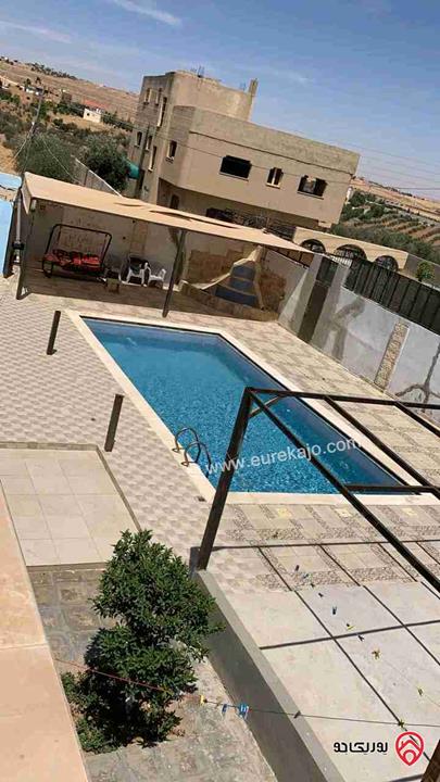 مزرعة مساحة 5 دونم وبناء 160م للبيع في مادبا - لب - قرب الجامعة الامريكية