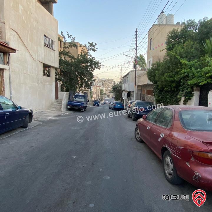 منزل مستقل مكون من طابقين ومخزنين على أرض 292م للبيع في عمان - ماركا