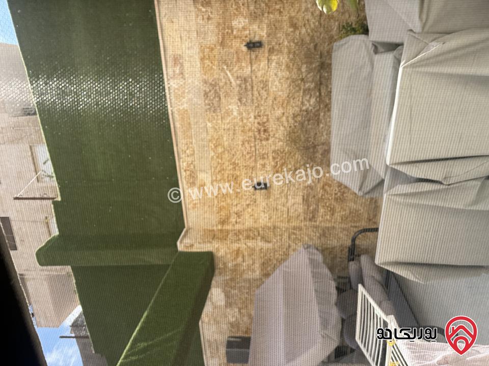 شقة ديلوكس أرضية مساحة 210م داخلي و 120م خارجي للبيع مفروشة في عمان - تلاع العلي