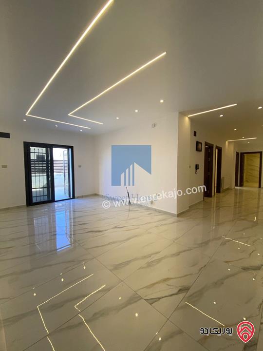 شقة أرضية 170م مع ترس 100م تشطيب سوبر ديلوكس لم تسكن للبيع في عمان - تلاع العلي