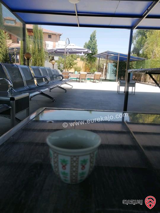 مزرعة ومنتجع مساحة الأرض 3 دونم و 700م والبناء 250م للبيع في اربد - كفر سوم قوشان مستقل استثمارية وسكنية