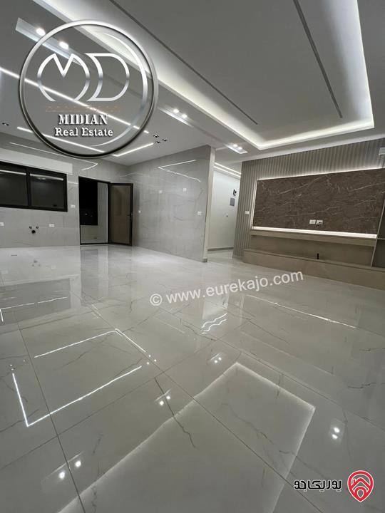 شقة شبه ارضي جديدة للبيع في عمان - ضاحية الرشيد مساحة 225م مع ترس 100م تشطيبات سوبر ديلوكس بسعر مميز 