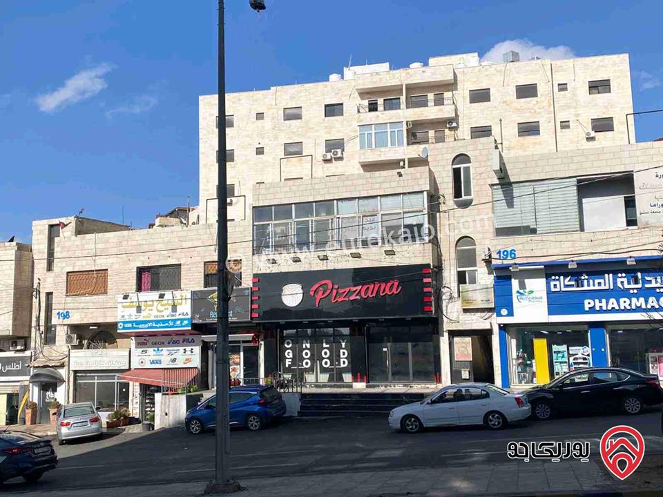 قطعة أرض مساحة 785م عليها مبنى تجاري للبيع في عمان - تلاع العلي