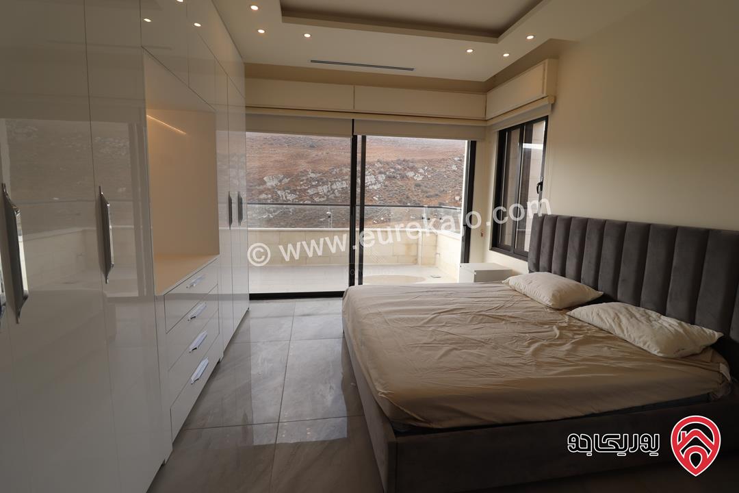 شقة فاخرة مفروشة طابق أرضي مساحة 220م داخلي و 50م خارجي للايجار في عمان - عبدون