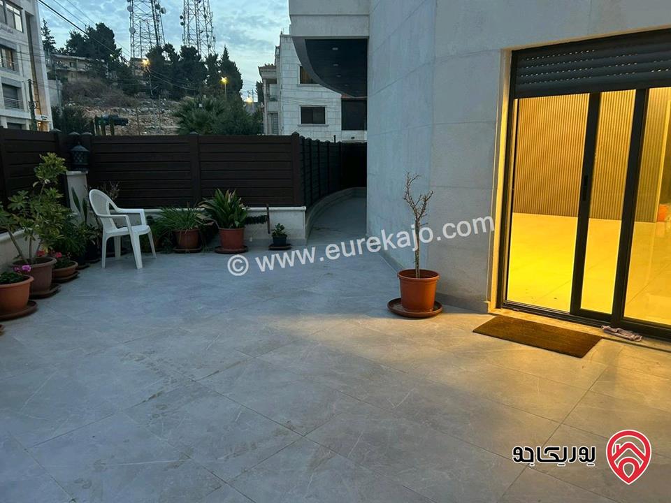 شقة مميزة طابق أرضي مساحة 201م للبيع في عمان - دابوق( سكن خاص ) مع ترس خارجي واطلالة مميزة