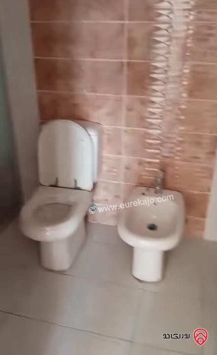 شقة ارضية مساحة 100م داخلي و 100م خارجي للبيع في عمان - الرابية