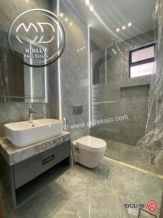 شقة جديدة شبه ارضي فارغة للايجار في عمان - دابوق مساحة 200م مع تراسات 150م تشطيبات وديكورات عصرية فاخرة