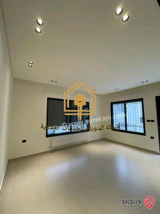 شقة جديدة طابق أرضي مساحة 165م داخلي و 180م خارجي للايجار في عمان - حي الصحابة 