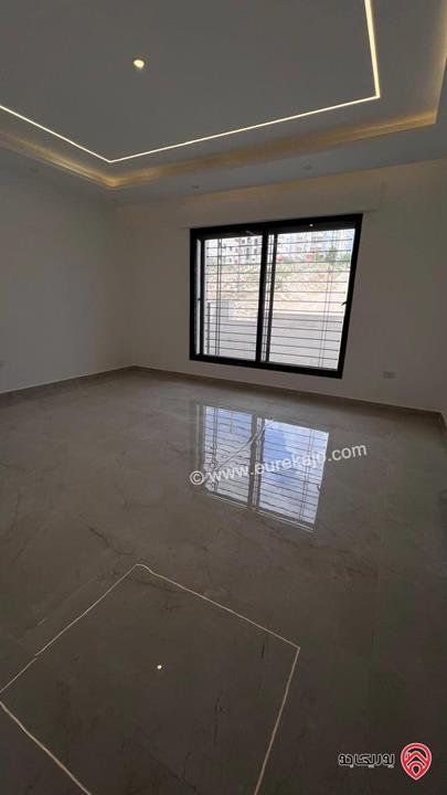 شقة أرضية مساحة 169م للبيع في إسكان جديد لم يسكن في عمان - الجبيهة حي المنصور