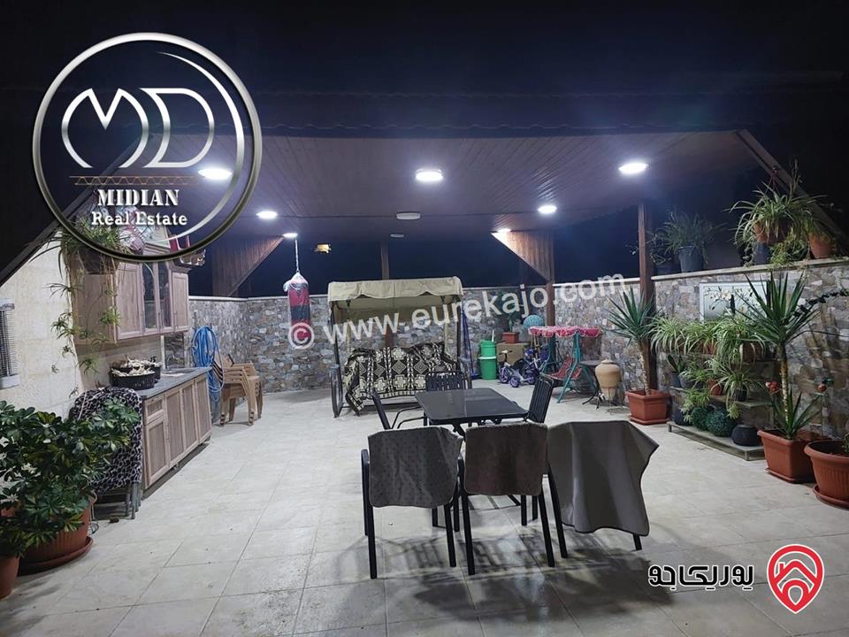 شقة ارضية للبيع في عمان - حي الصحابة مساحة 205م مع ترس و حديقة 70م تشطيبات ديكورات سوبر ديلوكس بسعر مميز