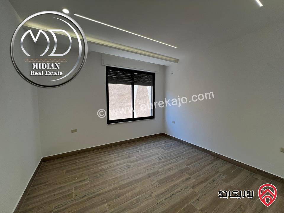 شقق شبه ارضي جديدة للبيع في عمان - ام اذينة مساحات 165م & 185م مع تراسات و حدائق تشطيبات ديكورات عصرية فاخرة 