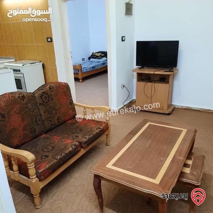 عمارة سكنية مكونة من 4 طوابق مؤجرة لطالبات (شقق مفروشة) على أرض 670م للبيع في اربد - الحي الجنوبي