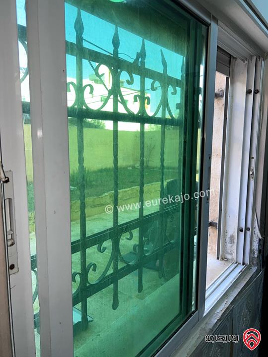 شقة شبه أرضية مساحة 100م داخلي و 100م خارجي للبيع في عمان - الجبيهة 