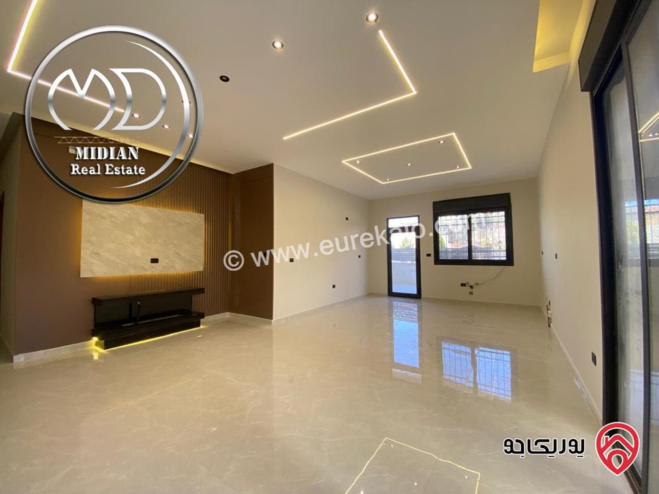 شقة ارضية جديدة للبيع في عمان - تلاع العلي مساحة 210م مع ترس و حديقة 140م تشطيبات ديكورات عصرية فاخرة بسعر مميز