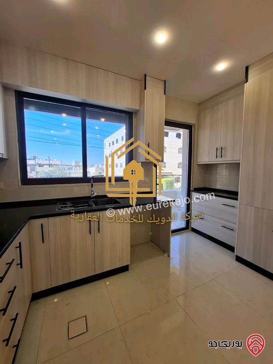 شقة جديدة لم تسكن طابق ثاني مساحة 150م للإيجار في عمان - الجندويل 