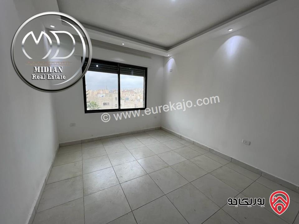 شقة دوبلكس طابق اخير مع روف للبيع في عمان - خلدا مساحة 150م مع تراس بسعر مميز جداً