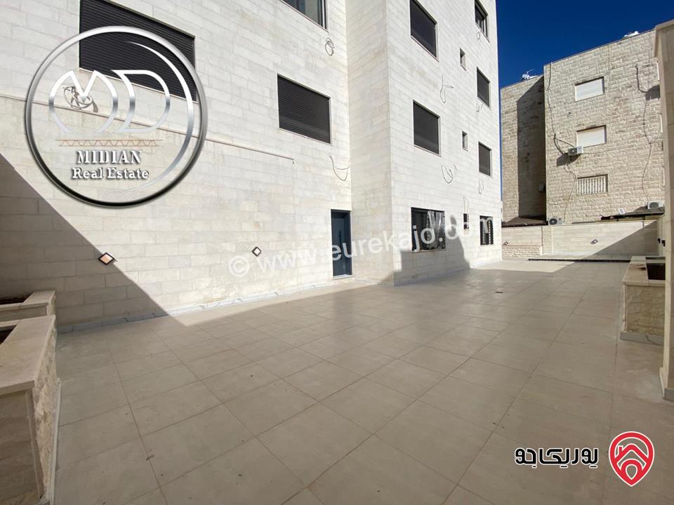 شقة شبه أرضي جديدة للبيع في عمان - خلدا مساحة 265م 4 نوم مع ترس و حديقة 250م تشطيبات و ديكورات عصرية فاخرة