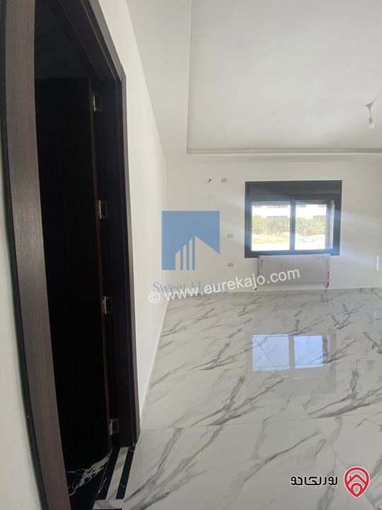 شقة فاخرة طابق ثاني مساحة 200م تشطيب سوبر ديلوكس لم تسكن للبيع في عمان - تلاع العلي