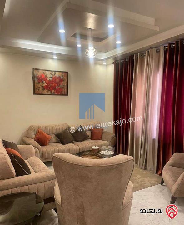 شقة مميزة شبه أرضية مساحة 130م للبيع في عمان - خلدا