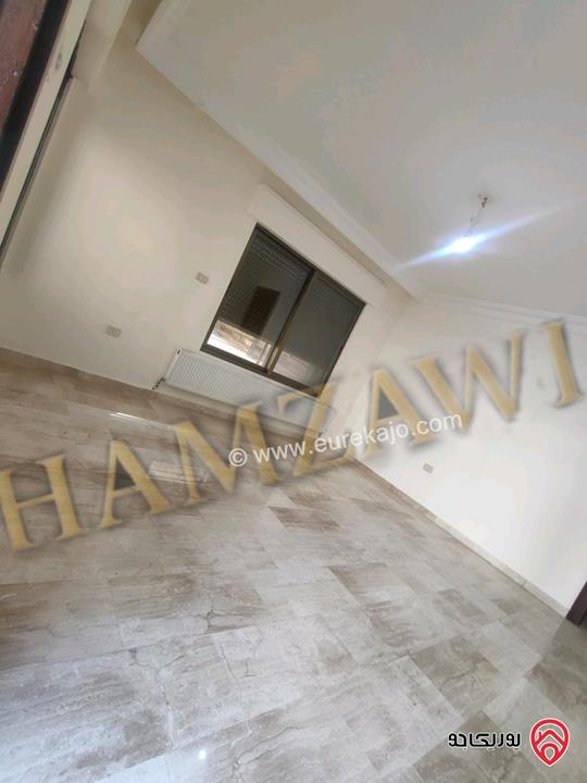 شقة فارغة طابق ارضي مساحة 100م داخلي و 120م خارجي للإيجار في عمان - عبدون 