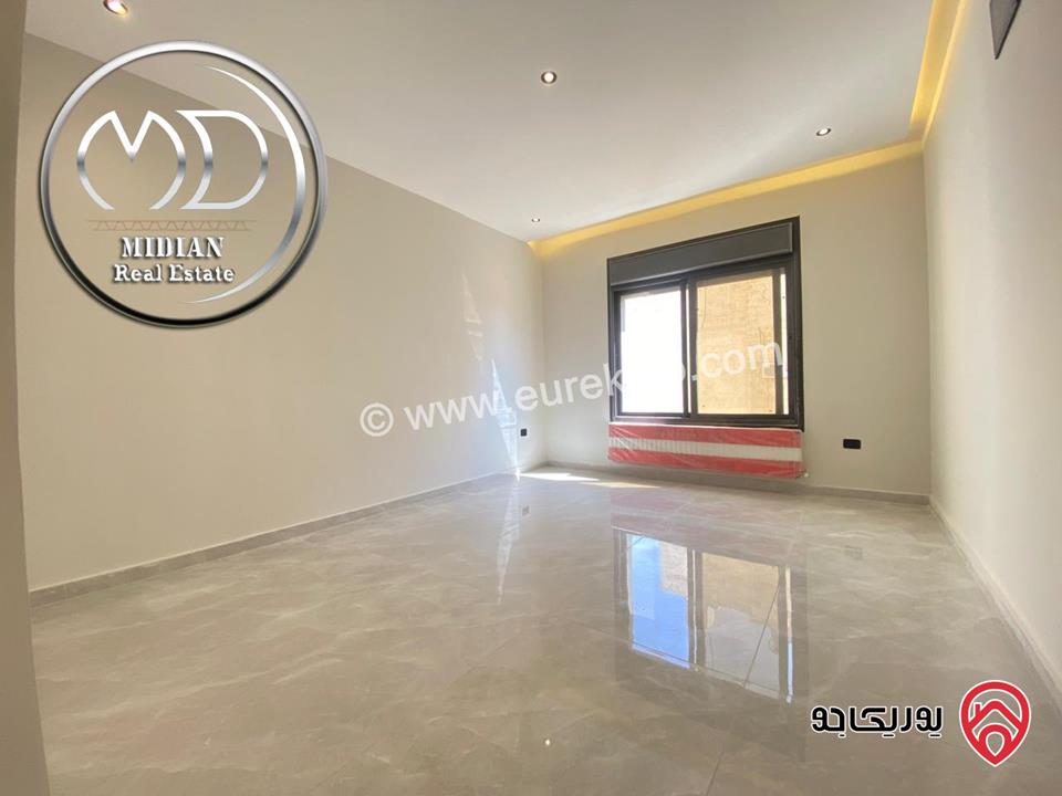 شقة ارضية جديدة للبيع في عمان - تلاع العلي مساحة 210م مع ترس و حديقة 140م تشطيبات ديكورات عصرية فاخرة بسعر مميز