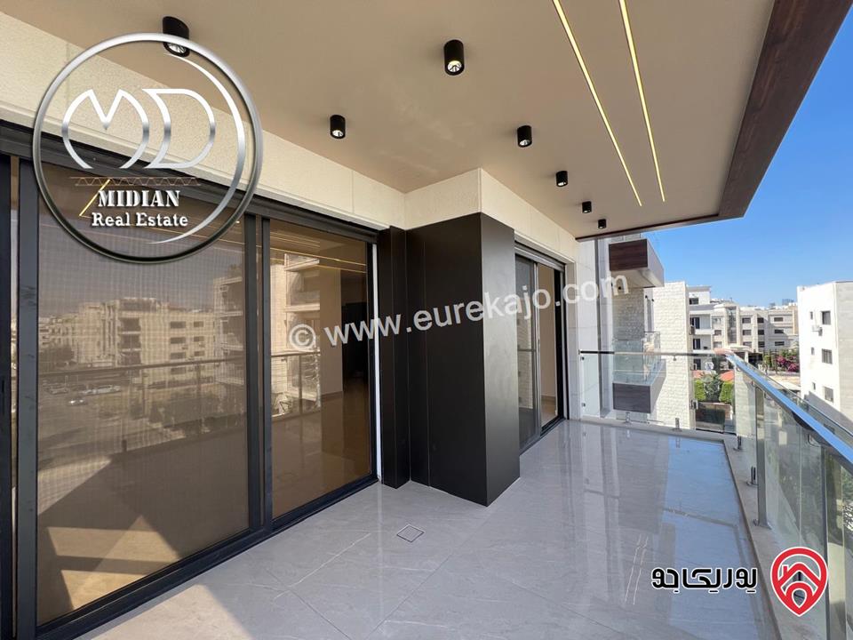 شقة دوبلكس جديدة طابق أخبر مع روف للبيع في عمان - حي الصحابة مساحة 215م مع تراسات اطلالة رائعة بسعر مميز